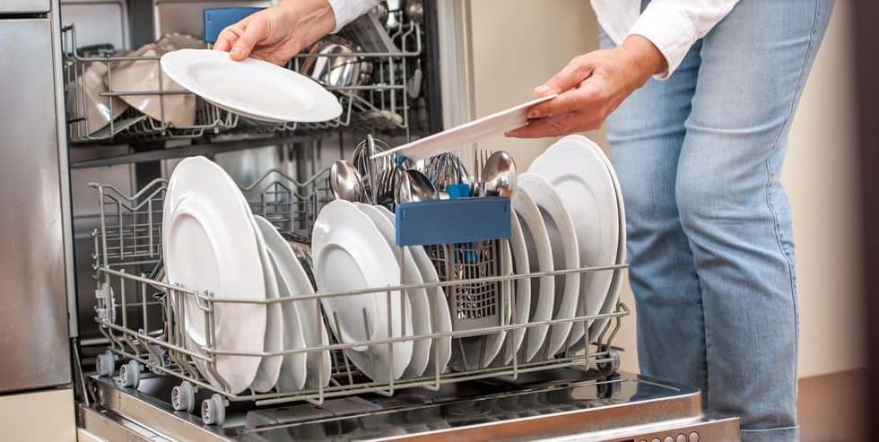 adult-woman-unloading-dishwasher-in-the-kitchen-royalty-free-image-1594133280 adult woman unloading dishwasher in the kitchen royalty free image 1594133280