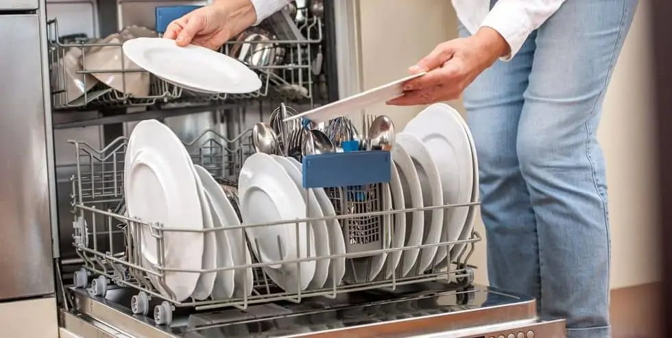 adult-woman-unloading-dishwasher-in-the-kitchen-royalty-free-image-1594133280 adult woman unloading dishwasher in the kitchen royalty free image 1594133280